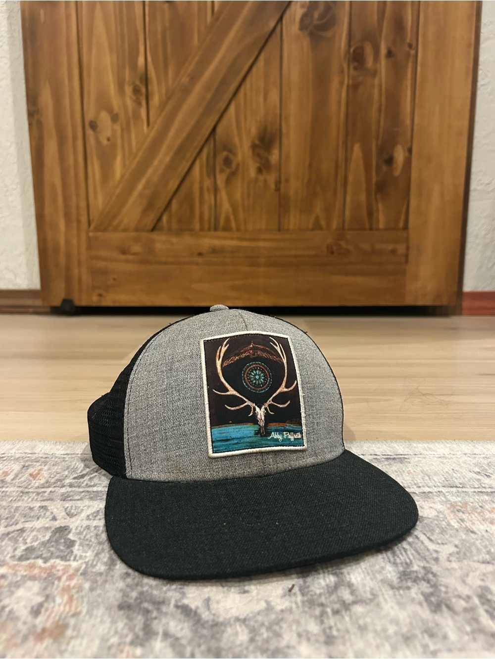 Grey and Black Trucker Hat with Antler Patch